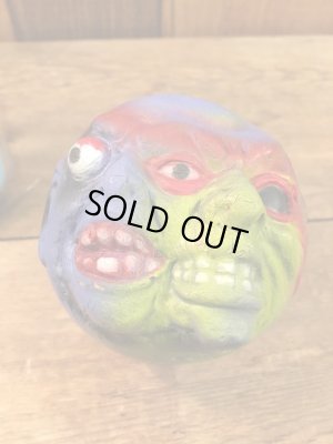 ビンテージのマッドボールバットとボールの袋入り