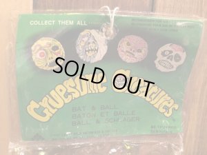 ビンテージのマッドボールバットとボールの袋入り