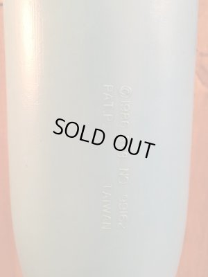 ビンテージのマッドボールバットとボールの袋入り