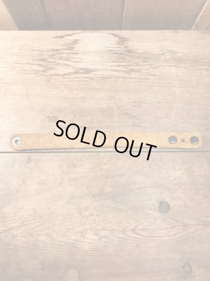 70年代頃のヒッピーデザインのビンテージレザーブレスレット