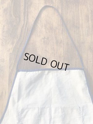 コットン製のジョーク系のヴィンテージエプロン