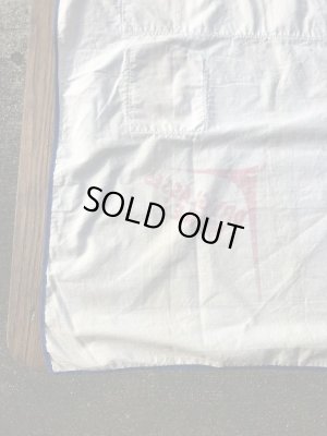 コットン製のジョーク系のヴィンテージエプロン