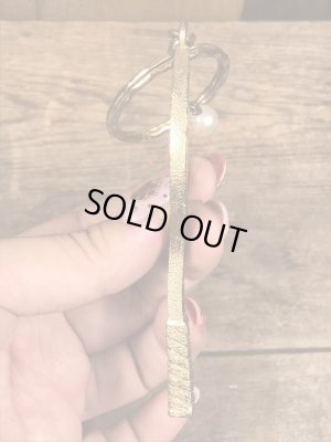 70年代頃〜のパールの玉が付いたテニスラケットのビンテージキーホルダー