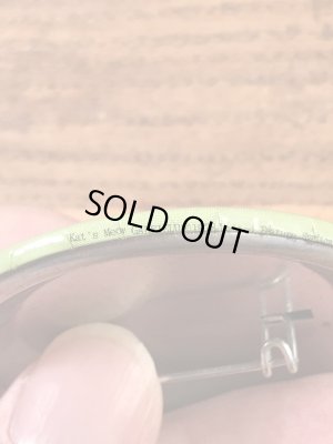 花を持っているガーフィールドが描かれた80’sヴィンテージ缶バッチ