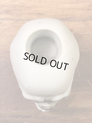 スカルオンブックの陶器製の50年代ビンテージマッチホルダー