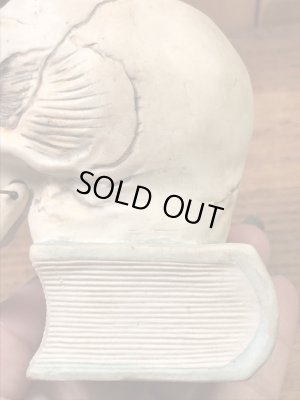 顎がゆらゆら揺れるスカルオンブックの50’sヴィンテージマッチホルダー