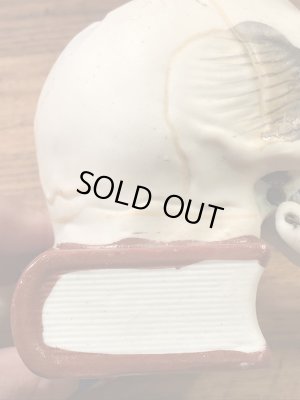 顎がゆらゆら揺れるスカルオンブックの50’sヴィンテージマッチホルダー