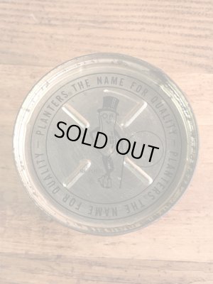 企業キャラクターのミスターピーナッツの70年代ビンテージブリキ缶