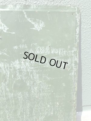 企業キャラクターのケネルレーションの50年代ビンテージ看板