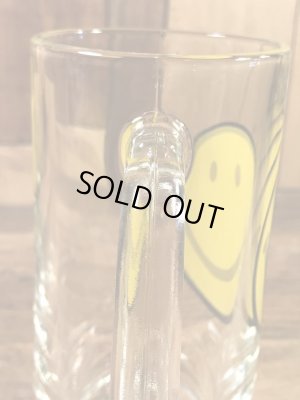 スマイルフェイスが描かれたガラス製の70’sヴィンテージジョッキグラス