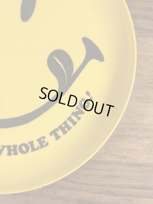 スマイルのプラスチック製の70年代ビンテージお皿