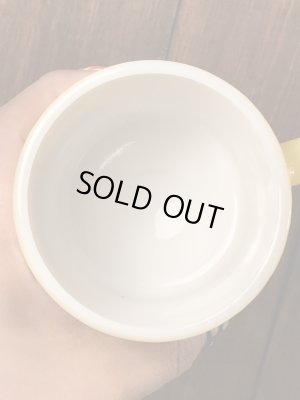 スマイルのミルクガラス製の70年代ビンテージマグカップ