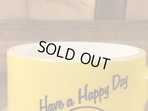 スマイルフェイスとHave A Happy Dayが描かれた70’sヴィンテージヘーゼルアトラスマグ