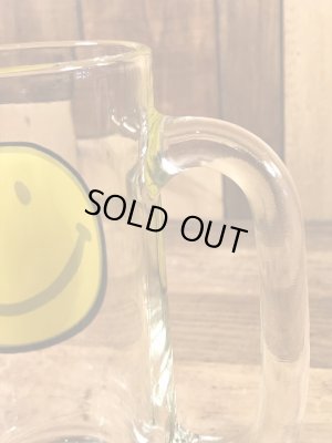 スマイルフェイスが描かれたガラス製の70’sヴィンテージジョッキグラス