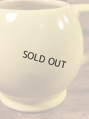 スマイルフェイスのセラミック製の70’sヴィンテージマグカップ