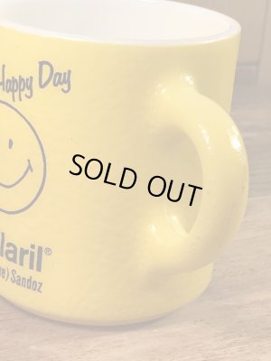 スマイルフェイスとHave A Happy Dayが描かれた70’sヴィンテージヘーゼルアトラスマグ