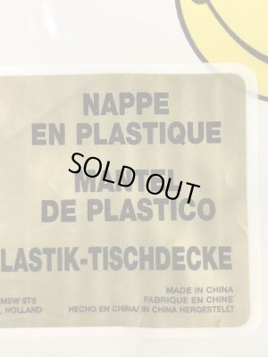 スマイルフェイスのビニール製の80’s〜ヴィンテージテーブルカバー