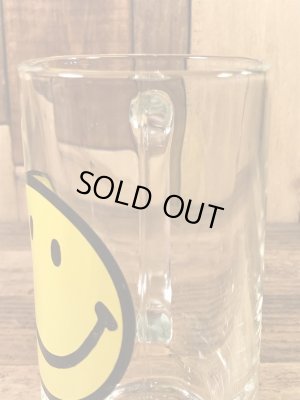 スマイルフェイスが描かれたガラス製の70’sヴィンテージジョッキグラス