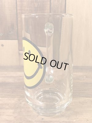 スマイルフェイスが描かれたガラス製の70’sヴィンテージジョッキグラス