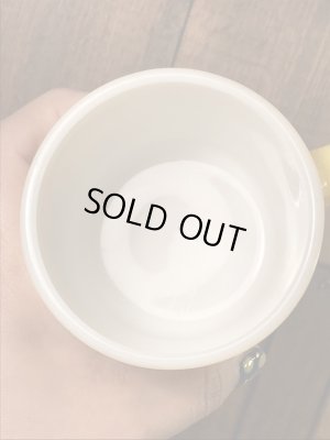 スマイルフェイスとHave A Happy Dayが描かれた70’sヴィンテージヘーゼルアトラスマグ