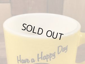 スマイルフェイスとHave A Happy Dayが描かれた70’sヴィンテージヘーゼルアトラスマグ