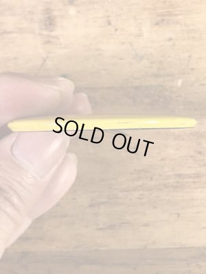 スマイルフェイスのブリキ製の70’sヴィンテージ缶バッチ