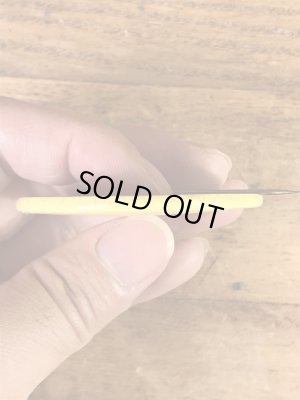 スマイルフェイスのブリキ製の70’sヴィンテージ缶バッチ