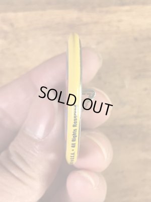 “The One With The Most Buttons Wins”と書かれたスマイルの80年代ビンテージ缶バッジ