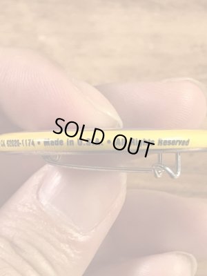 “The One With The Most Buttons Wins”と書かれたスマイルフェイスの80’sヴィンテージ缶バッチ