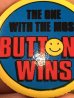 “The One With The Most Buttons Wins”と書かれたスマイルの80年代ビンテージ缶バッジ