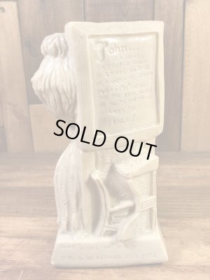 “World's Best Teacher...”のメッセージが書かれたシリスカルプスの70年代ビンテージメッセージドール