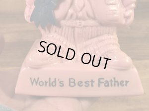 “World's Bast Father”のメッセージが書かれたシリスカルプスの70年代ビンテージメッセージドール