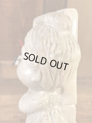 “World's Best Teacher...”のメッセージが書かれたシリスカルプスの70年代ビンテージメッセージドール