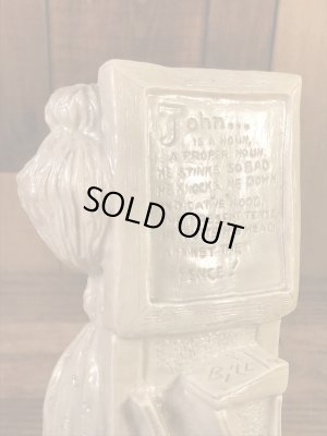 “World's Best Teacher...”のメッセージが書かれたシリスカルプスの70年代ビンテージメッセージドール