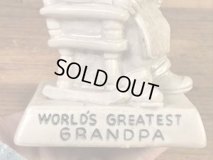 “World's Greatest Grandpa”のメッセージが書かれたシリスカルプスの70年代ビンテージメッセージドール