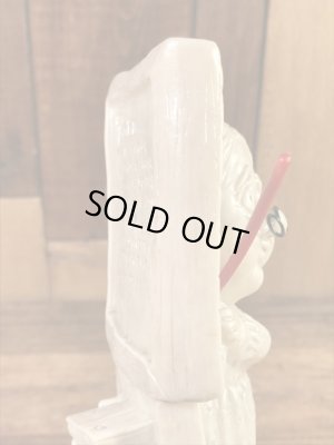 “World's Best Teacher...”のメッセージが書かれたシリスカルプスの70年代ビンテージメッセージドール