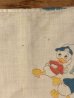 ミッキーやミニーマウスなどのディズニーキャラクターが描かれた60〜70年代ビンテージ枕カバー