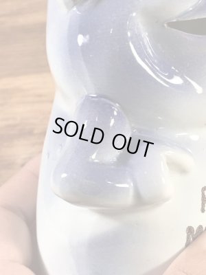 サイコセラミックスみたいなメッセージが書かれた60’sヴィンテージコインバンク