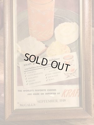 木製の額縁にクラフトチーズの広告が入った40’sヴィンテージ壁掛け