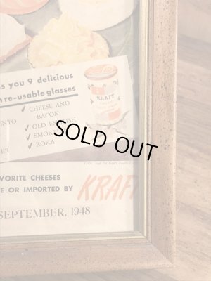 木製の額縁にクラフトチーズの広告が入った40’sヴィンテージ壁掛け