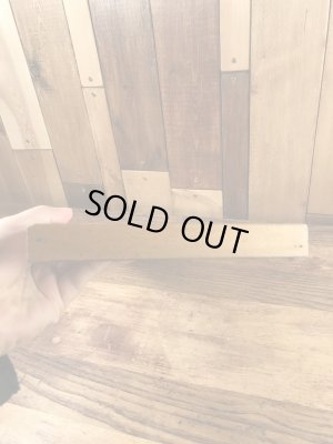 木製の額縁にクラフトチーズの広告が入った50’sヴィンテージ壁掛け