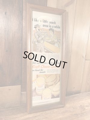 ガラスの額縁にクラフトチーズの広告が入った50年代ビンテージ壁掛け