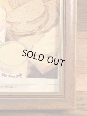 木製の額縁にクラフトチーズの広告が入った50’sヴィンテージ壁掛け