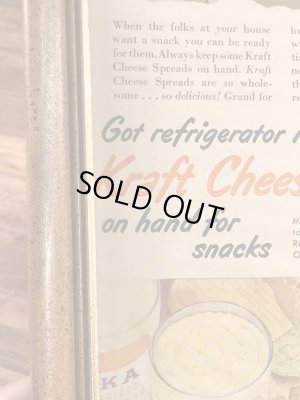 ガラスの額縁にクラフトチーズの広告が入った50年代ビンテージ壁掛け