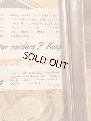 木製の額縁にクラフトチーズの広告が入った50’sヴィンテージ壁掛け