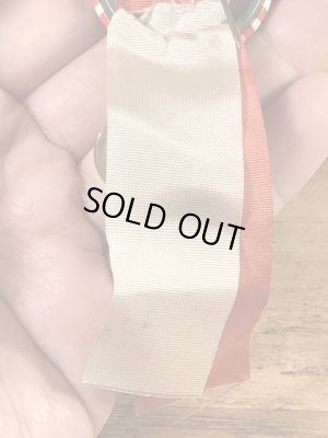 カレッジ物のフットボール大会の40’sヴィンテージ缶バッチ