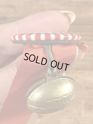 カレッジ物のフットボール大会の40’sヴィンテージ缶バッチ