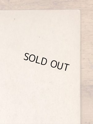 Up And Cunningのメッセージが書かれたピンナップガールの40’sヴィンテージカード