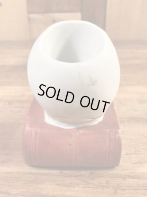 スカルオンブックの陶器製の50年代ビンテージマッチホルダー