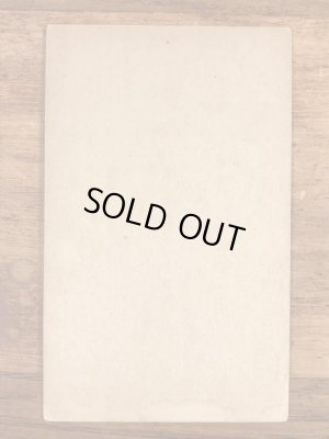 Up And Cunningのメッセージが書かれたピンナップガールの40’sヴィンテージカード